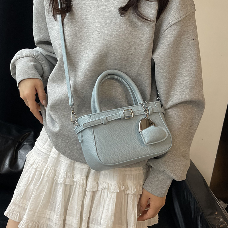 Bolso Tote de diseño de nicho 2025 verano nuevo estilo bolso de hombro con patrón de lichi bolso de mensajero de amor de moda mujer