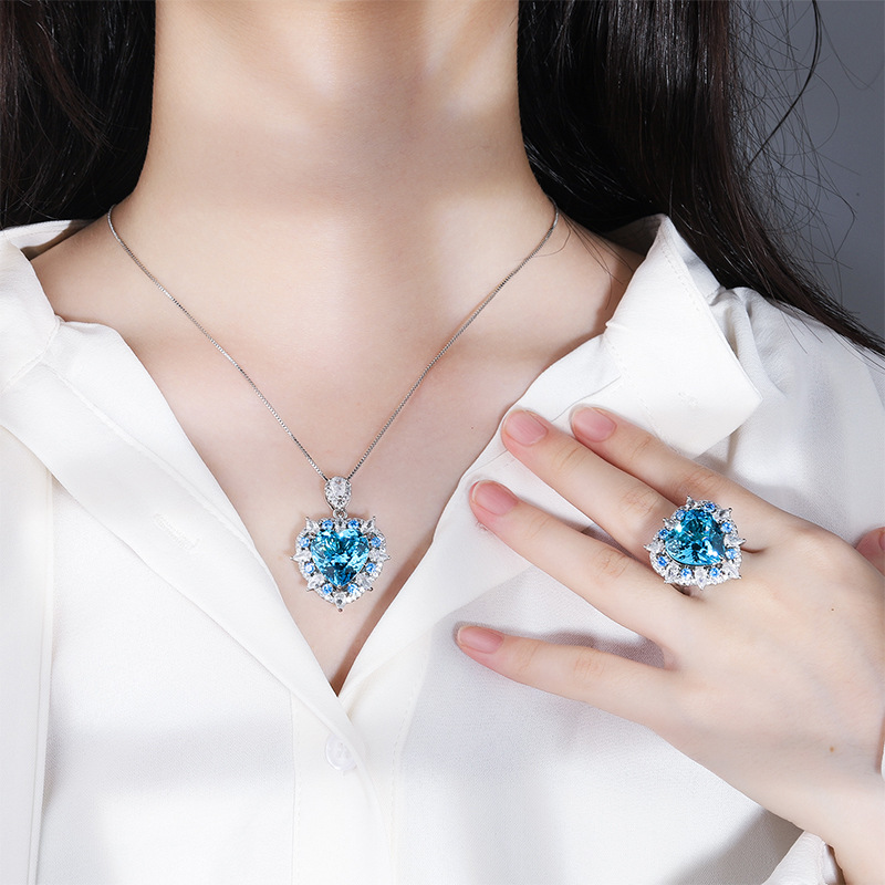 Zhuang Sheng joyería de cobre inferior chapado en oro océano corazón traje de simulación azul marino tesoro colgante anillo traje principal 15*15