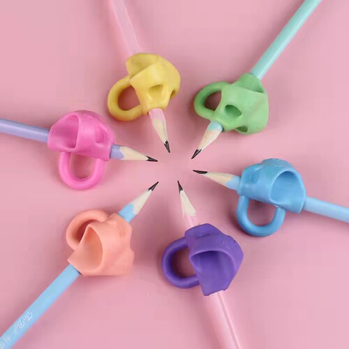 Children's silicone pen holder writing pen holder corrects grip posture primary school students' pen grip corrects three-finger pen holder wholesale