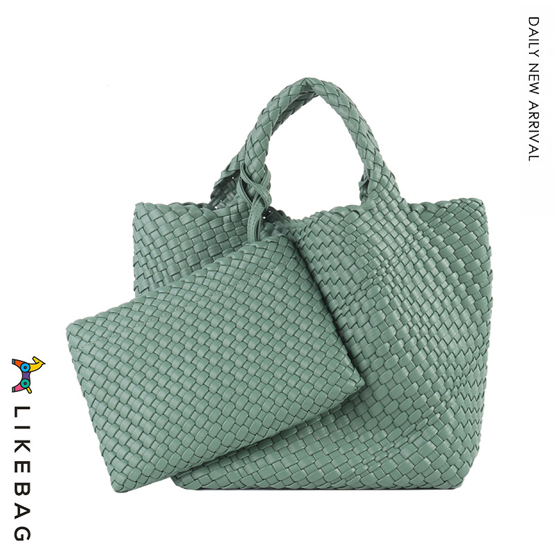 Bolso de mano de viajero de negocios transfronterizo bolso de mano de gran capacidad tejido PU 2022 nueva moda casual tejida Madre y niño bolsa