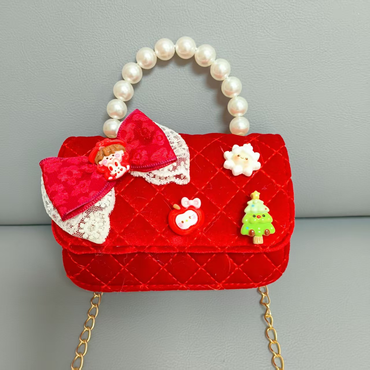 Cartera de Año Nuevo rojo arco de papá Noel bolso de perla pequeña cadena de viento fragante bolso de hombro