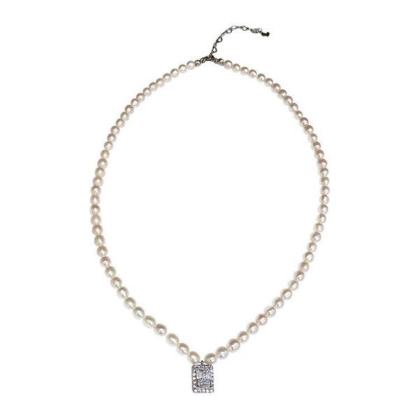 Retro set with zircon from pearl