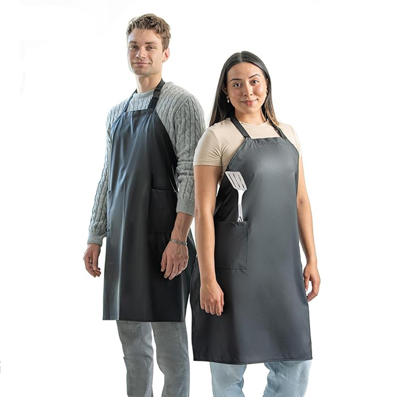 Nuevo delantal de poliéster transfronterizo impermeable a prueba de aceite compuesto de tela comedor ropa de trabajo de cocina doméstica delantal fabricantes al por mayor