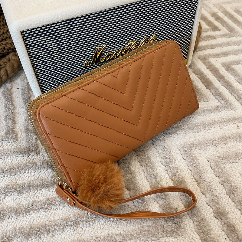 La cartera de las mujeres al por mayor 2022 nueva textura de la moda del embrague del todo-fósforo del bolso de dos monederos doblez de la cartera