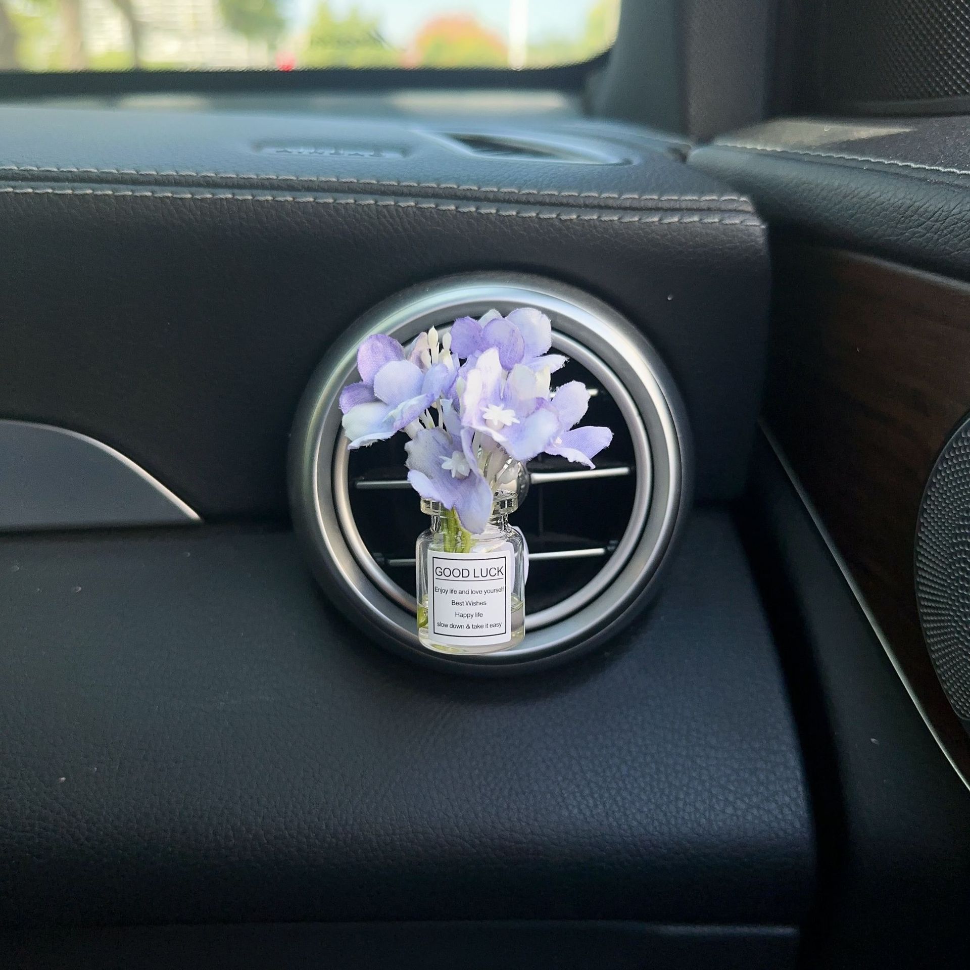 Decoración creativa de salida de aire del automóvil con flores de estrellas pequeñas frescas aire acondicionado botella de perfume de perfumes
