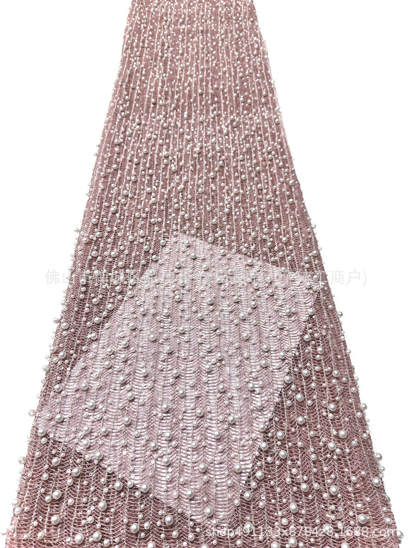 Tejido de malla de perlas hechas a mano de alto grado ondulado vertical tridimensional bordado de perlas vestido de boda tela de diseño