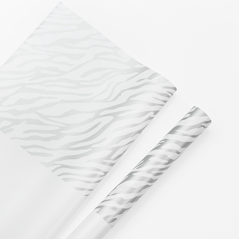 Huaxi Yuyin serie zebra flor de papel de embalaje comercio exterior transfronterizo al por mayor florista de material de ramo de flores