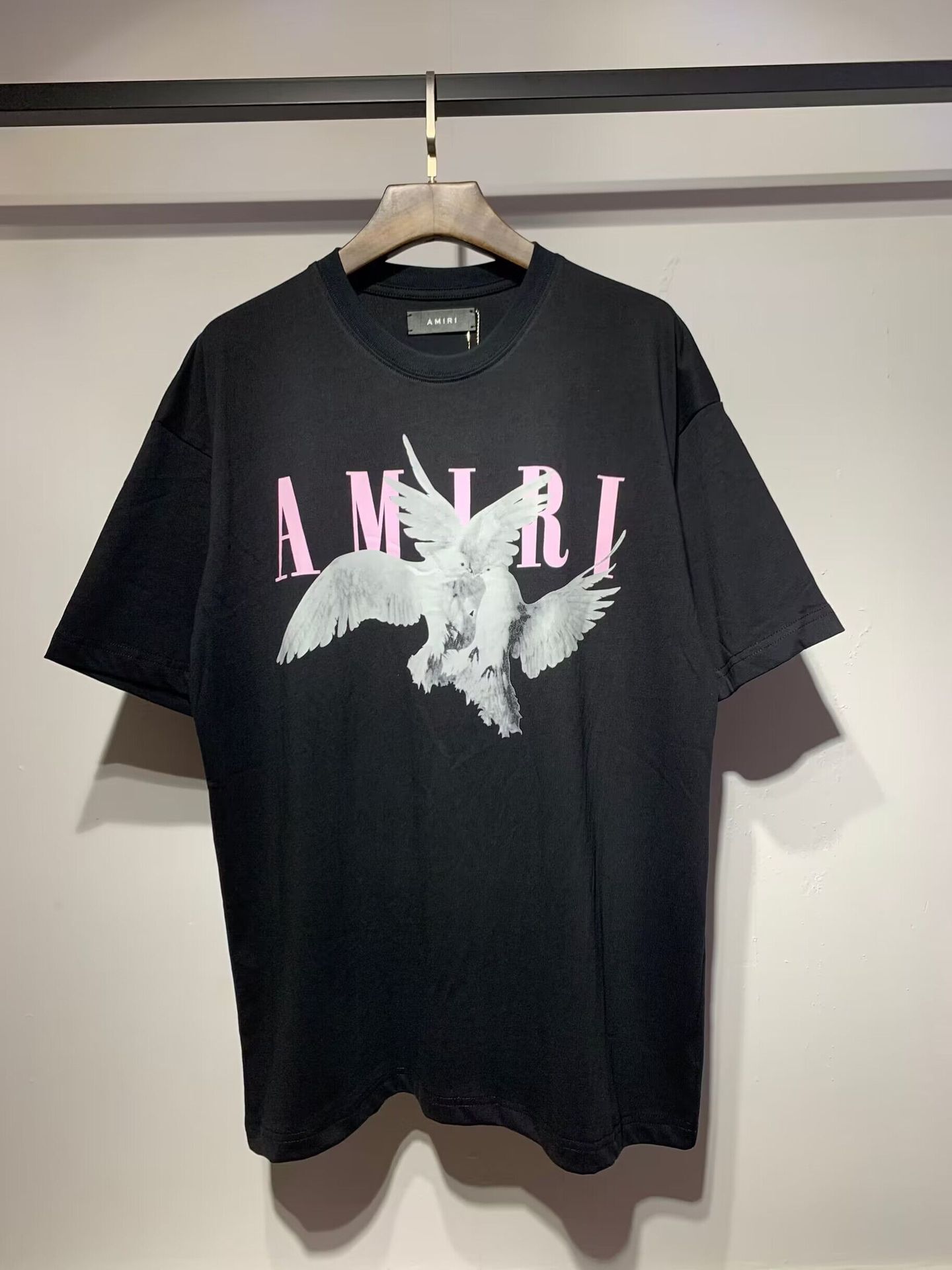 Verano nueva camiseta de manga corta impresa de letras suelta marca de moda hombre camiseta casual de media manga mujer