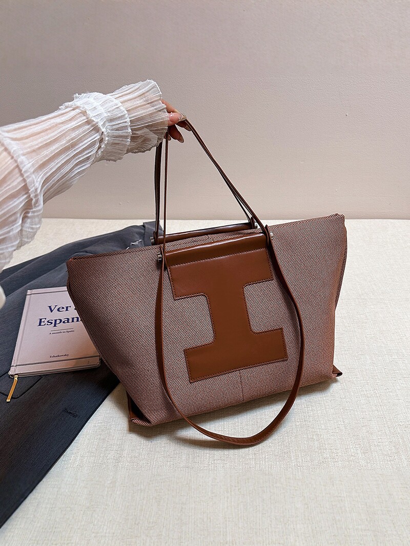 2026 nuevo bolso de hombro de viaje de gran capacidad de mujer bolso de moda versátil bolso de mano bolso de tendencia de diseño de color