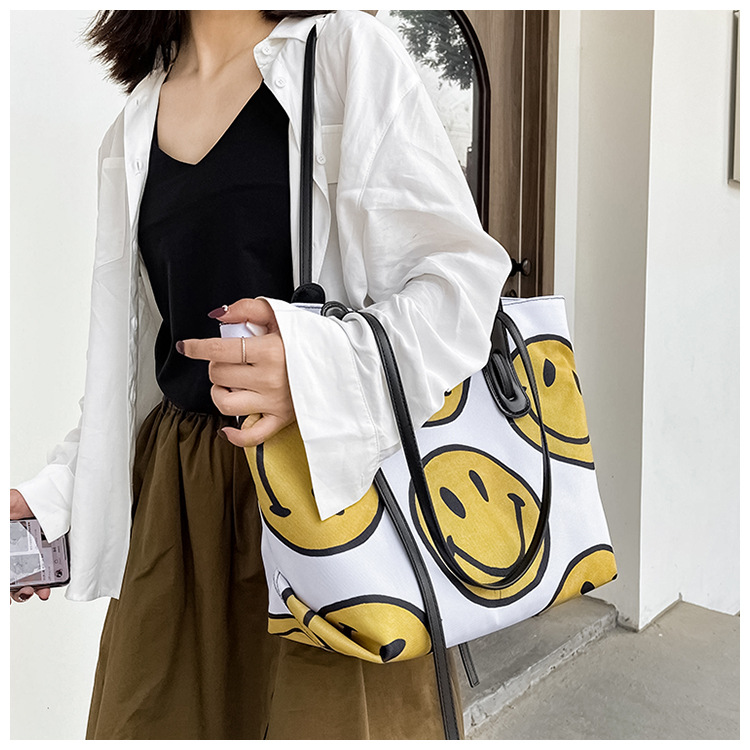 Korean Dongdaemun New Cute Fashion Smiley Canvas Women's Bag Printed Canvas Portable Shoulder Bag Large Tote Bag display picture 9