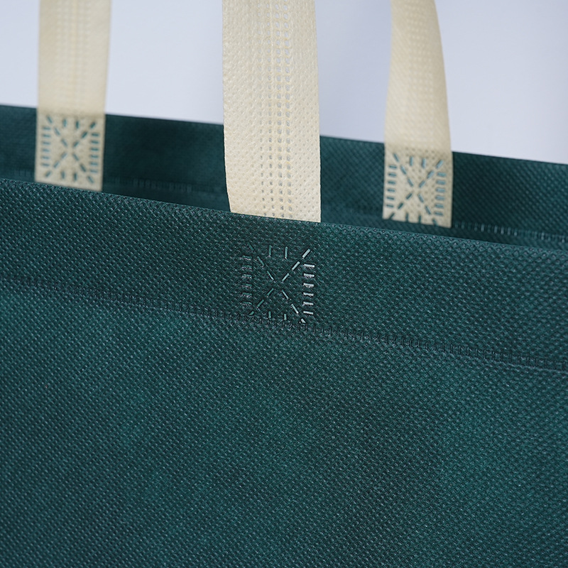 Bolsa de tela no tejida con logotipo impreso bolsa de compras de ropa de protección ambiental bolsa de publicidad corporativa tridimensional
