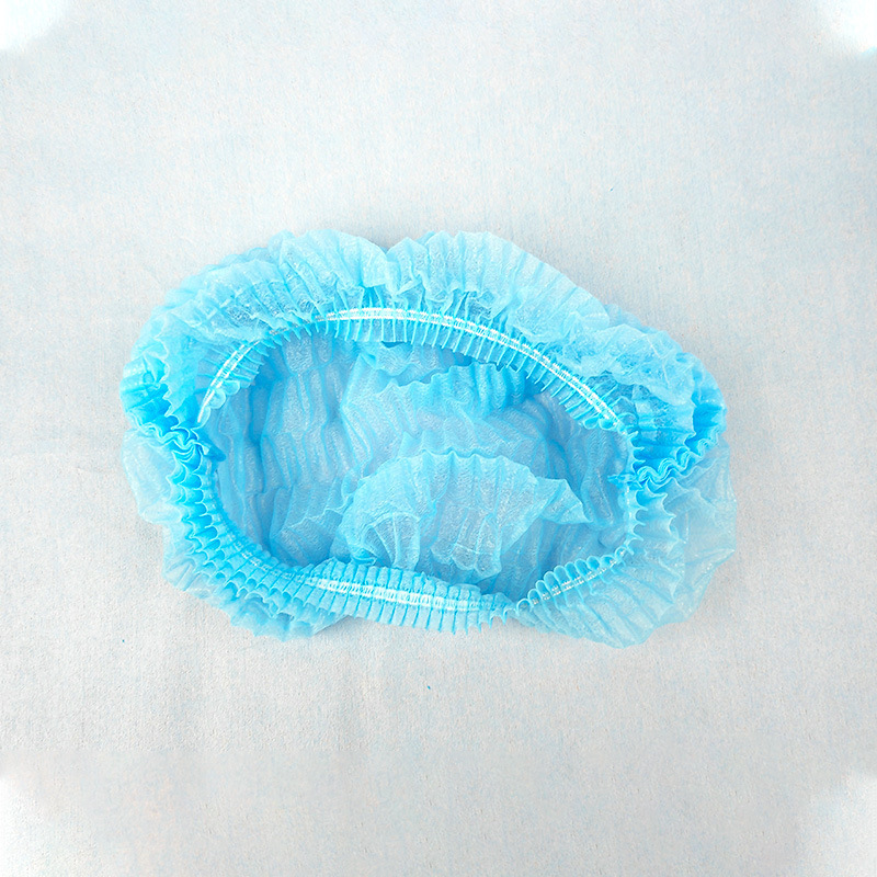 使い捨て帽子の頭を厚くして不織布工場のバーキャップをかぶせて防塵します。|undefined