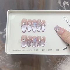 奈姿純手作業の光治療は甲九子を着て火猫の目から離れてネイルシールを再利用して分解することができる