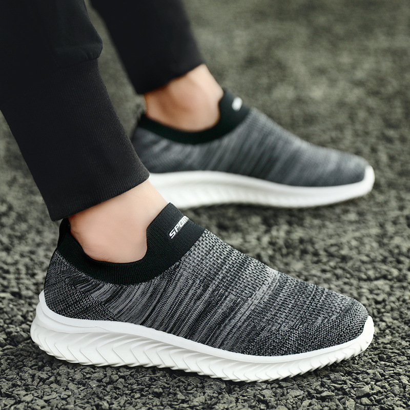 2025 primavera nueva pareja zapatos de tejido femenino cómodos zapatos casuales de malla transpirables zapatos deportivos de hombre zapatos de altura baja