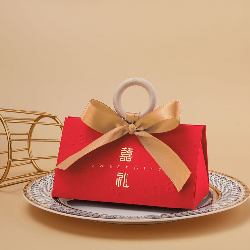 クリエイティブシャンパン色の手提げ婚約結婚結婚式の三角喜糖箱木環お土産魚尾紗喜糖箱|undefined