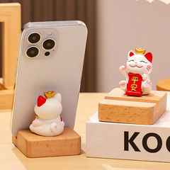 新型中国式招き猫携帯電話スタンドオフィスのデスクトップにアルバイトをしているサラリーマンの好物プレゼント