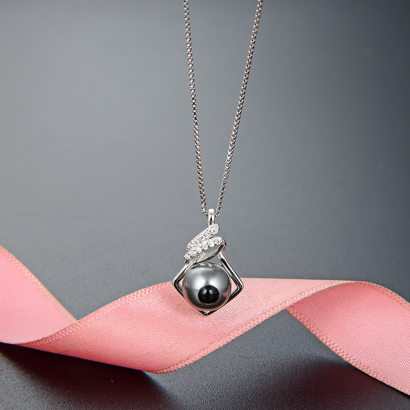 Europa y América simple nicho personalizado collar de cadena clavícula perla S925 plata estilo frío con incrustaciones colgante femenino al por mayor