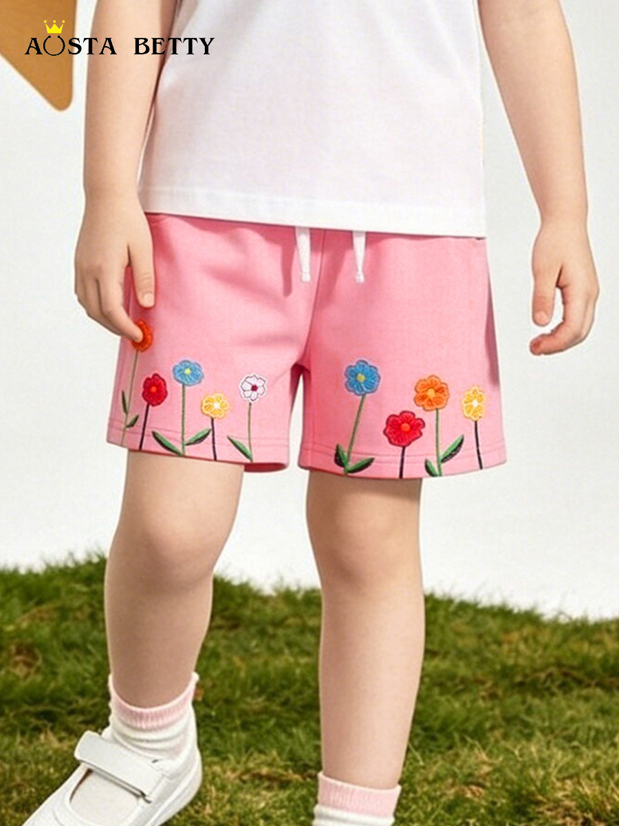 Fuente transfronteriza de verano nuevos pantalones cortos de niñas flores bordadas pegatinas pantalones deportivos de niñas de punto