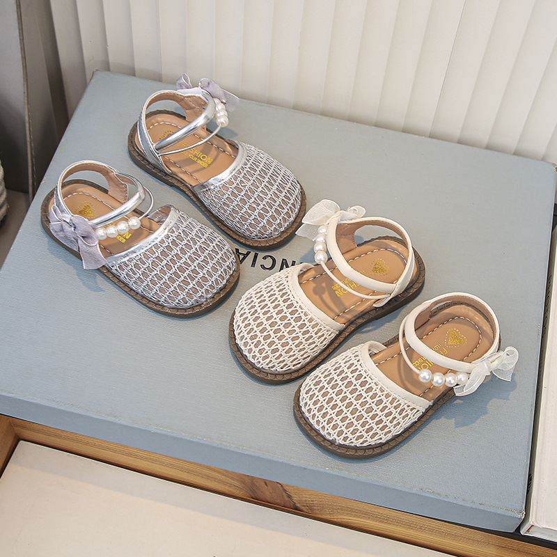 Sandalias para niñas 2025 nuevos zapatos de verano para niños moda Baotou zapatos de princesa tejidos zapatos de playa de suela blanda para niñas
