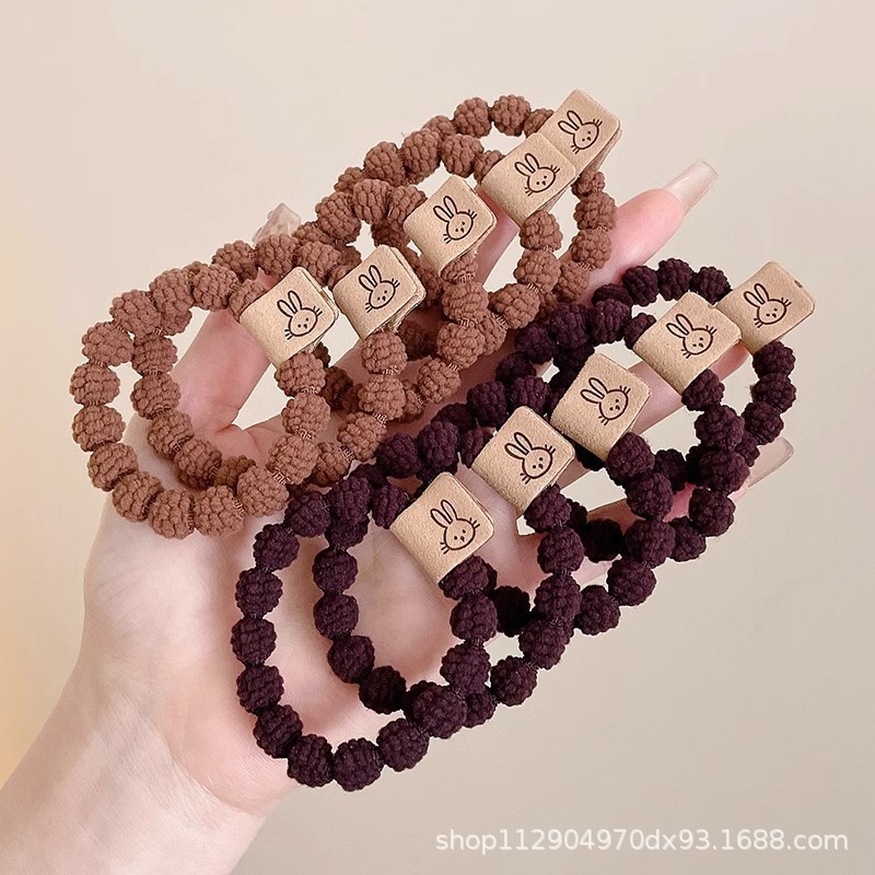 2025 nuevo estilo simple cabello de moda de alta elasticidad correa de correa de cabello multifuncional cubierta de cuero durable cabello bola adornamiento para el cabello