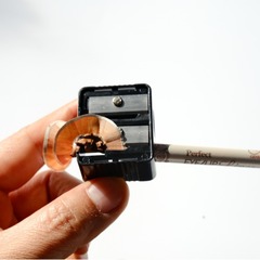 メーカー直販女性化粧筆削りプラスチック双穴巻筆刀工場の一手供給源