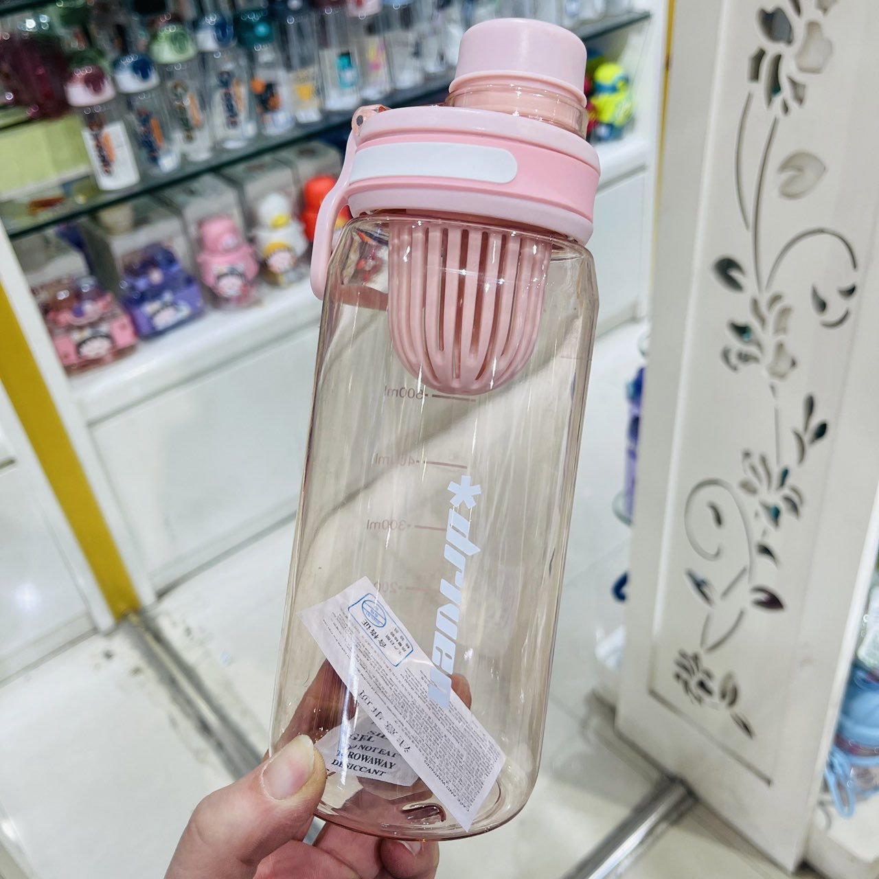 Jinshi deportivo al aire libre de una sola capa de plástico 1000ml taza espacial de gran capacidad torsión tapa de taza espacial de trabajadores de agua