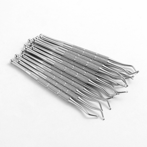 Manufacturer's dual-headed kick-up tool, embedded nail file, nail pick, groove scoop, toe nail cleaner, nail art tool