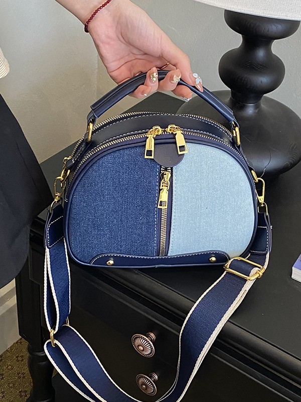 Bolso de mano de nicho coreano para mujeres 2026 comercio exterior nuevo denim empalme de color alto sentido versátil mochila