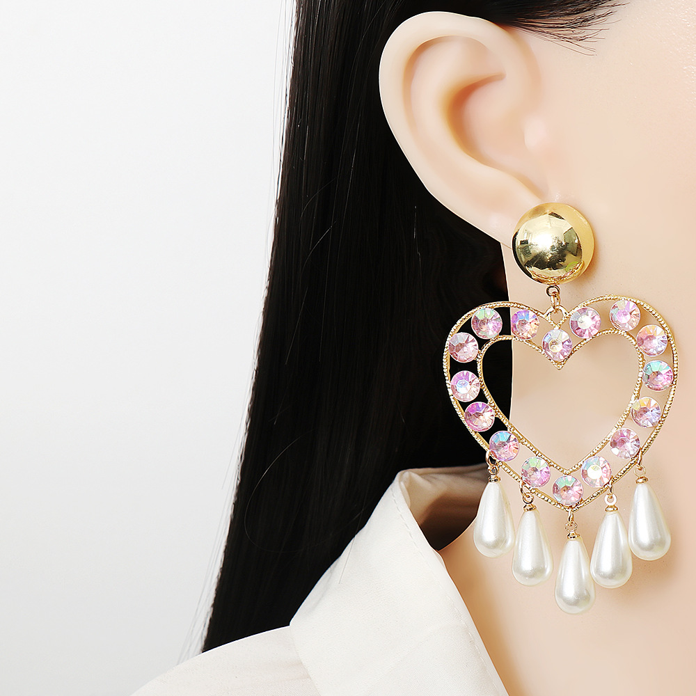 Creative Heart-shaped Water Drop Pearl Shape Female Stud Earrings display picture 2