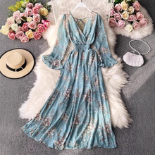 跨境2023秋V领喇叭袖高腰显瘦碎花连衣裙超仙森系收腰显瘦大摆长