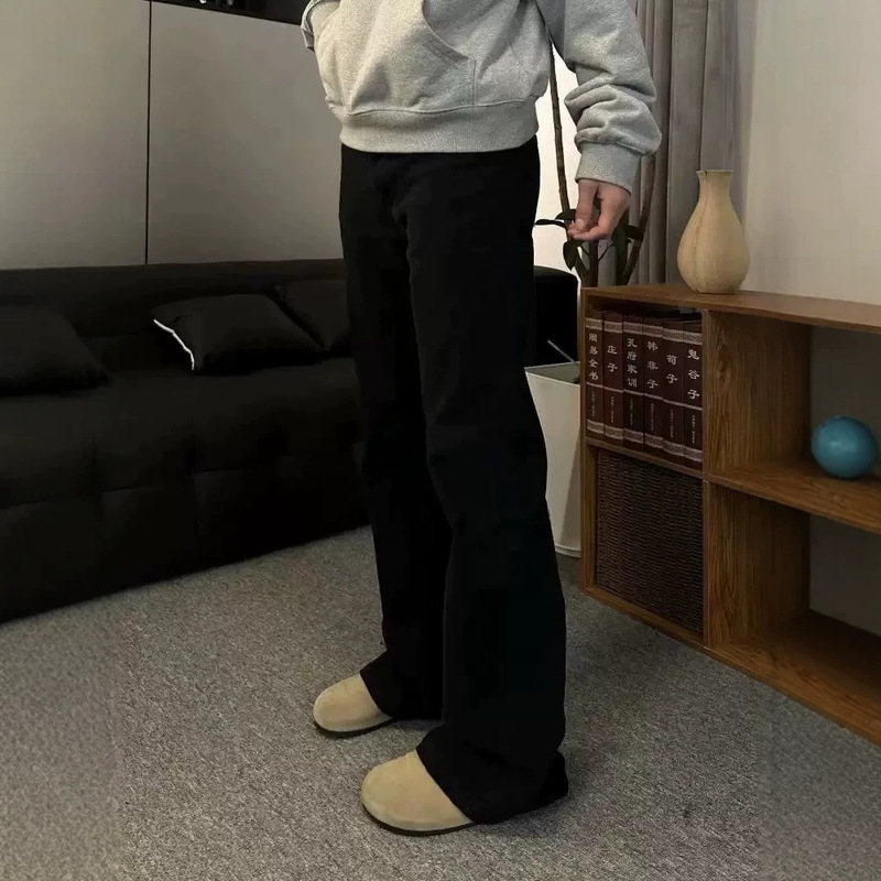 Paris-style alternative to high-street fashion brands, clean-fit black flared jeans for men, loose-fitting, slimming, straight-leg, floor-length pants