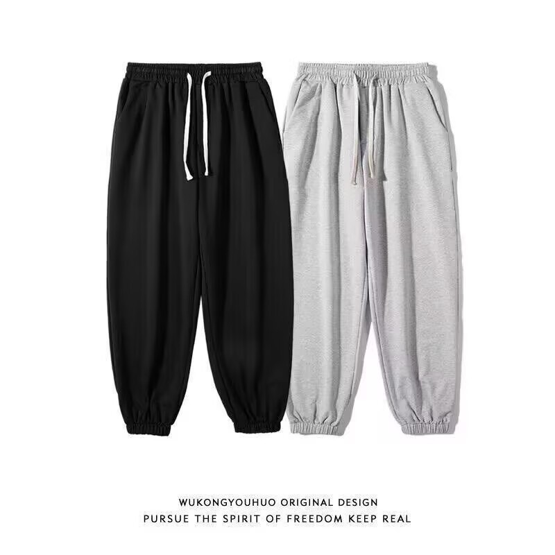 Simple solid color men's sports pants, spring and summer plus size casual pants, men's sweatpants, loose-fitting tapered cropped pants, men's trendy