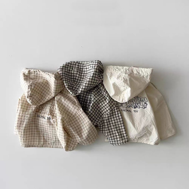 Estilo coreano INS de dibujos animados para niños a prueba de viento lindo abrigo cremallera con capucha estilo occidental de los niños abrigo de protección solar casual top