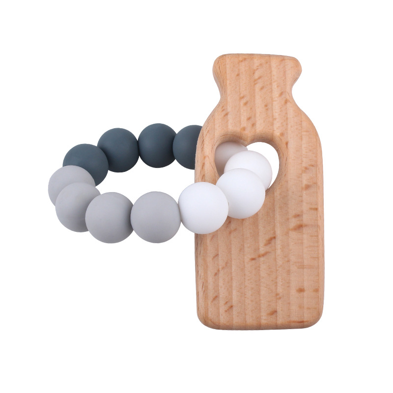 Nueva DIY creativo de dibujos animados juguete de haya mordedor bebé Beech biberón cuentas de silicona pulsera teether stick