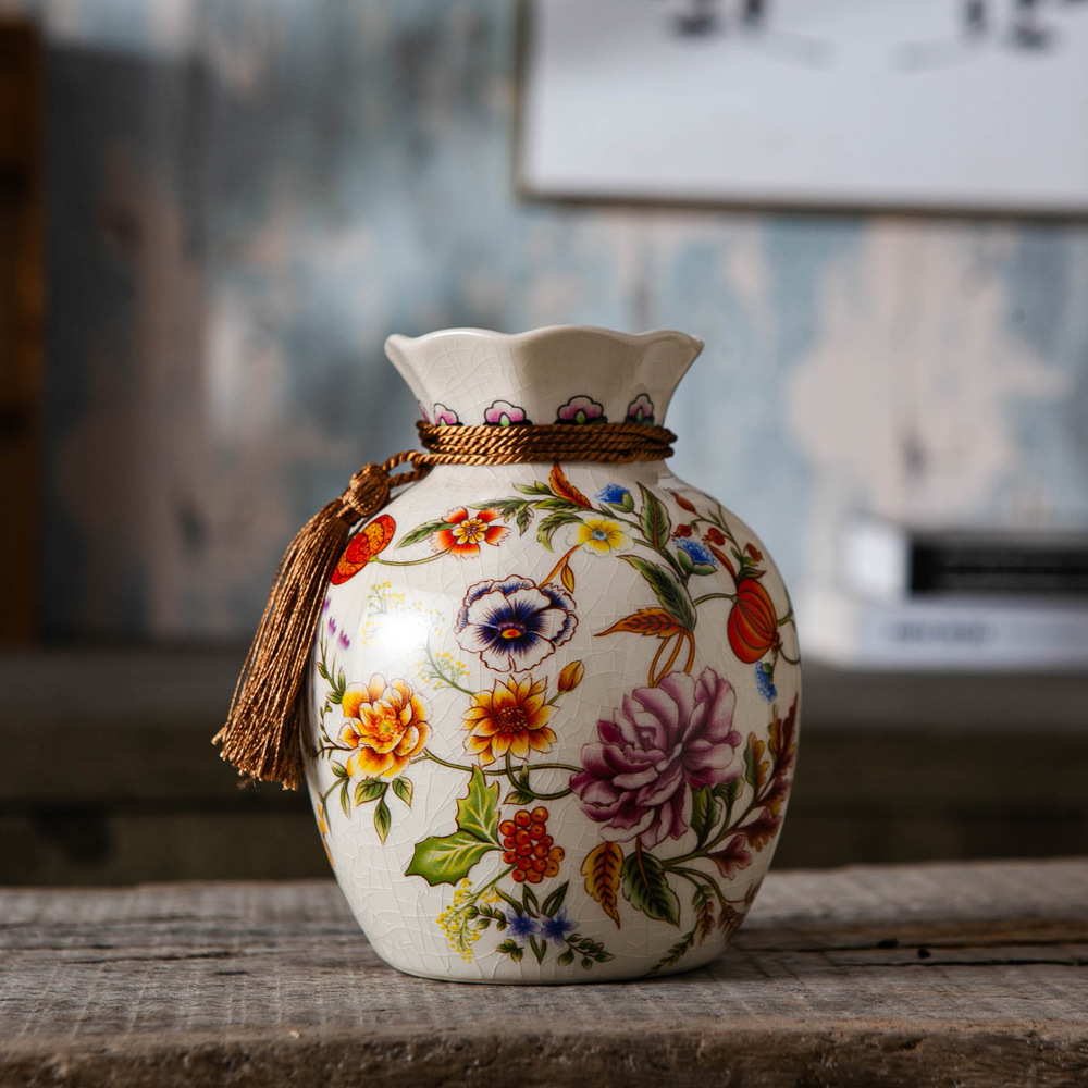 Vaso de cerámica estadounidense de alto valor, lujo ligero, creativo, nuevo estilo chino, mesa de comedor, pequeño jarrón, decoración de alto nivel.