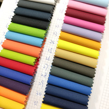 格中点PVC 户外冲锋衣防寒服面料 春亚纺提花格 格中点春亚纺布料