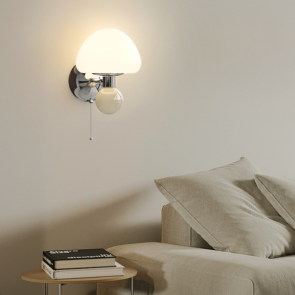 Cream sconce for bed