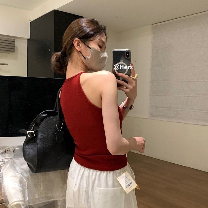 帆泰に頼ってレモンの黄色を修理して首のガーターのベストの女性の少女を掛けます。|undefined