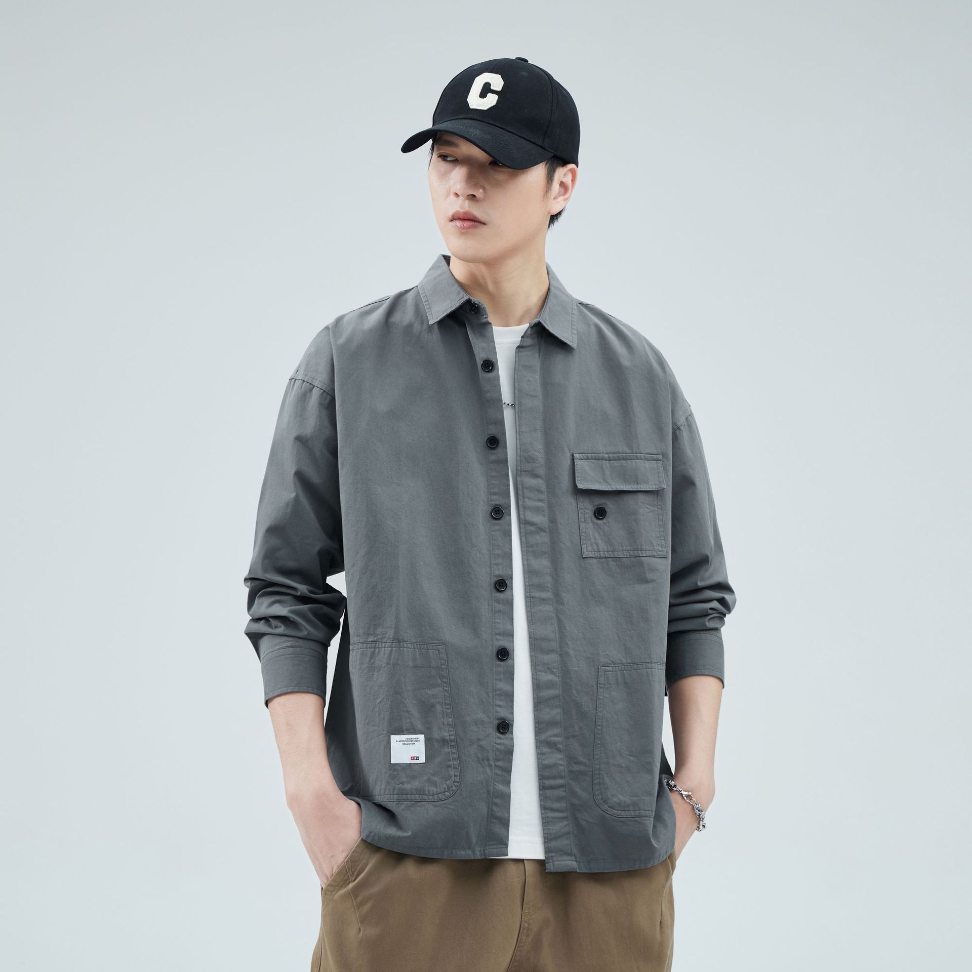 Camisa de trabajo holgada para hombre, primavera y verano, totalmente de algodón, estilo coreano, estilo americano informal, mangas tres cuartos, cuello único, bolsillo, transpirable y que absorbe la humedad.