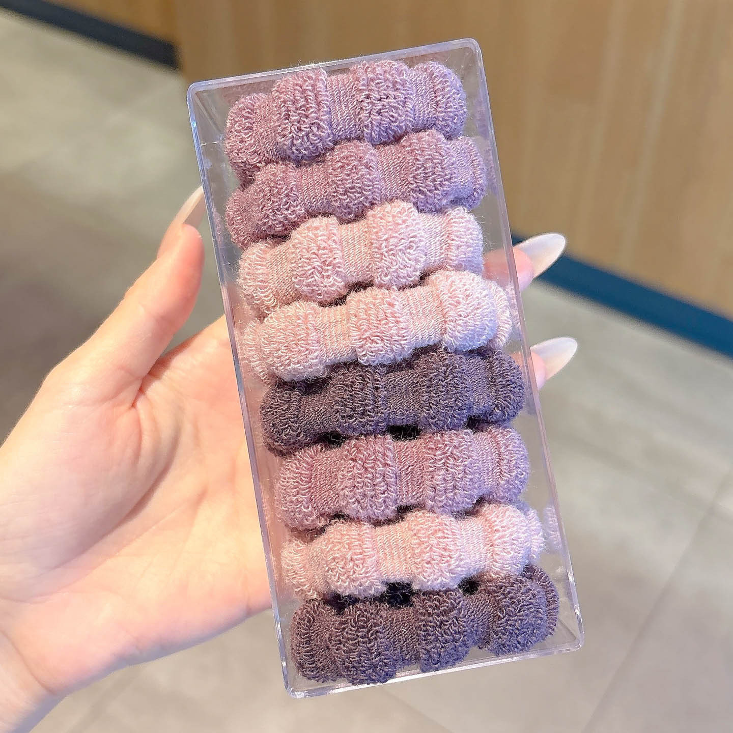 8 pink and purple hair ties