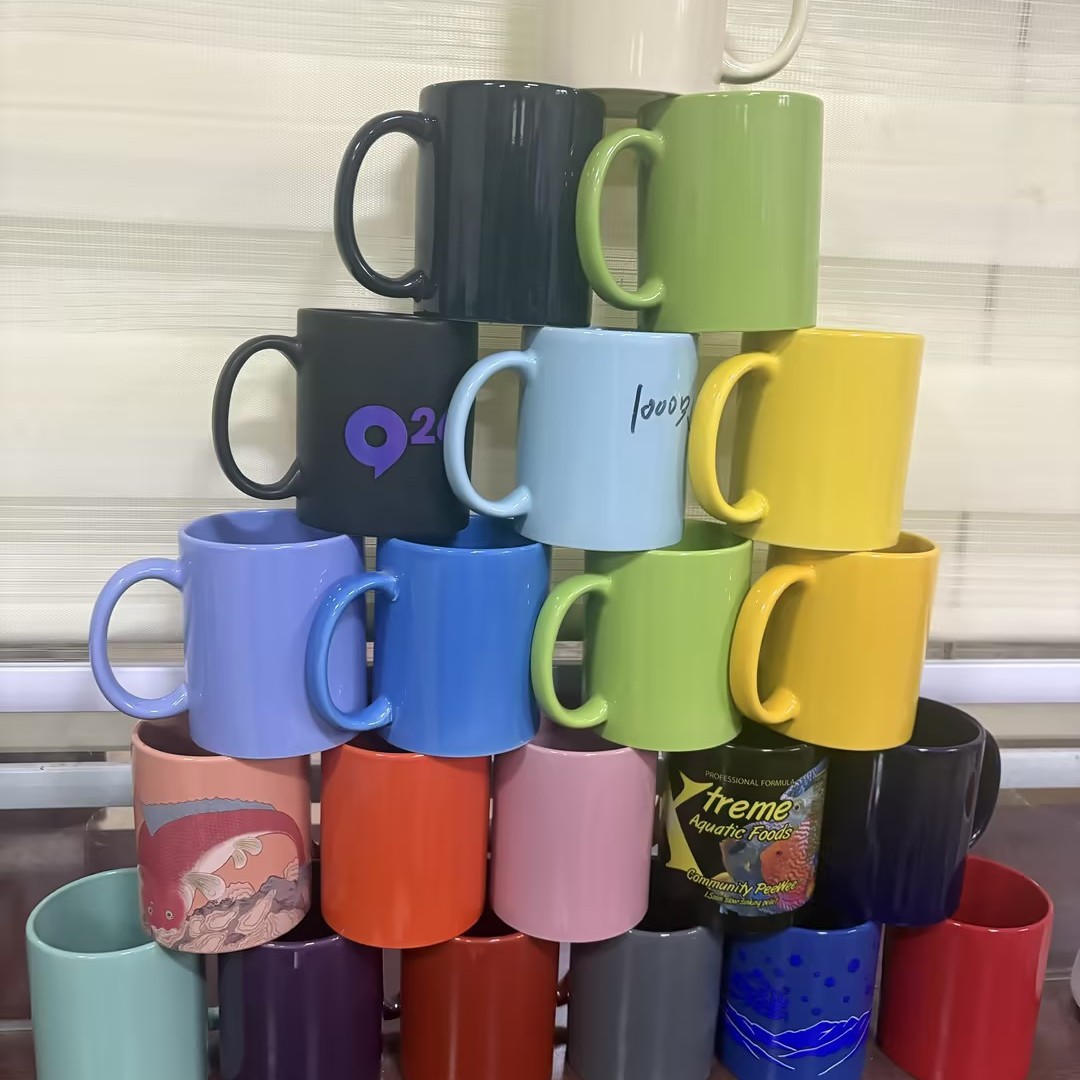 Fabricantes de tazas de cerámica personalizadas al por mayor suministro directo de comercio exterior 11oz impresión LOGO taza de sublimación de transferencia de calor hueso taza de agua de porcelana