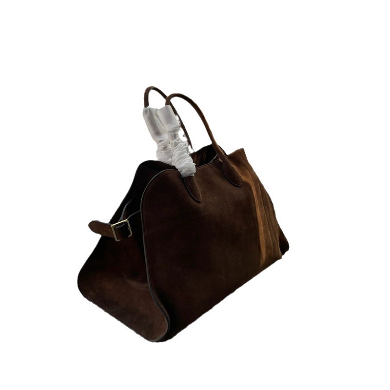 Pojemna torba na ramię The Row z prawdziwej skóry bydlęcej z zamszową warstwą wierzchnią. Margaux 15 Dong Jie to ta sama torebka na jedno ramię_voghion.com