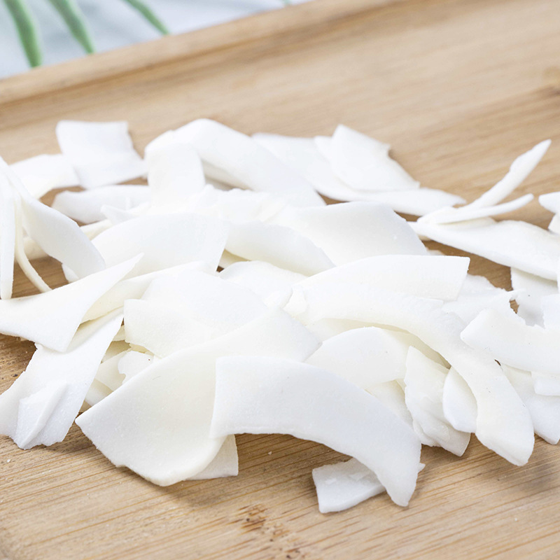 Wholesale Hainan coconut flakes coconut crisps 500g bulk coconut copra ready-to-eat snacks for children and pregnant women to satisfy their cravings