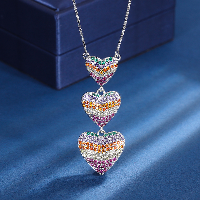 Zhuang Sheng joyería nueva venta caliente transfronteriza de color europeo y americano diamante micro-incrustaciones en forma de corazón traje temperamento joyería al por mayor