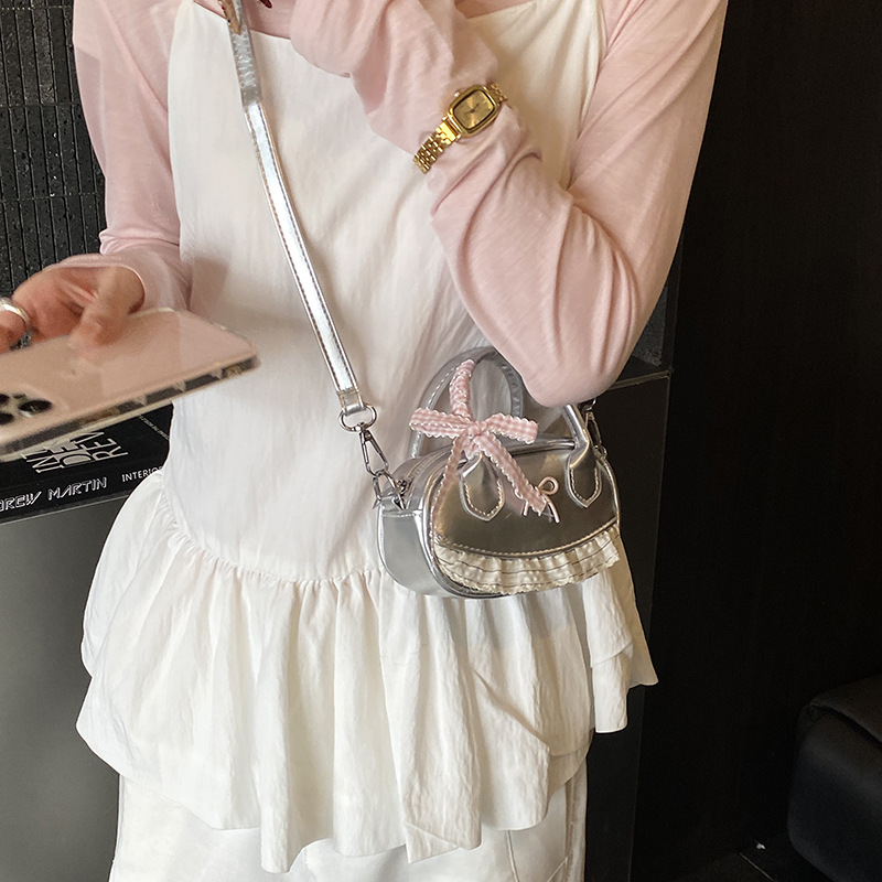 2026 nuevo bolso coreano para niños bolso de encaje de estilo extranjero bolso adorable arco bolso accesorios de niña pequeña