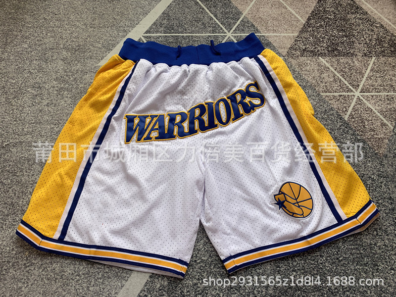 Comercio exterior pantalones de fútbol al por mayor Warriors Lakers 76 caliente Raptor mágico bolsillo bordado pantalones cortos pantalones de baloncesto NFL
