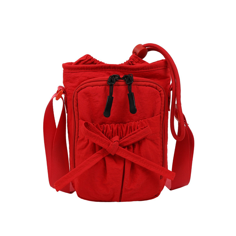 Bolso de teléfono móvil de moda coreana 2025 verano nuevo bolso femenino lindo lazo bolso de hombro bolso de mensajero de lona casual