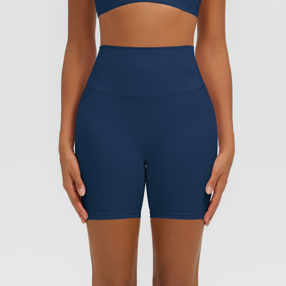 Nuevo tipo delgado de hielo, piel transpirable, ajustado, color sólido, ropa de yoga, pantalones cortos de tres puntos.