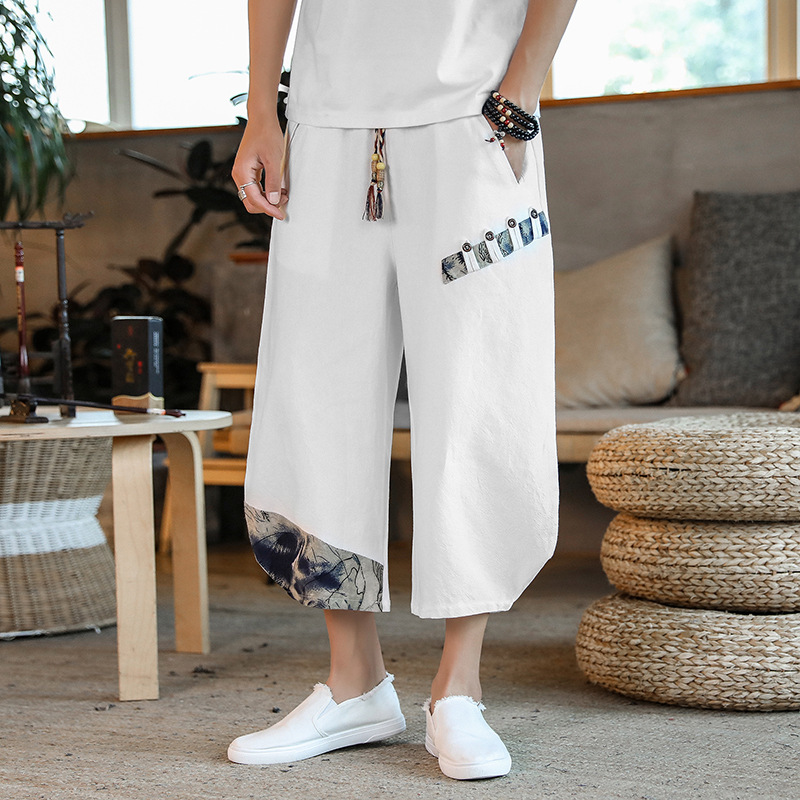 New thin and breathable cotton and linen casual plus-size harem pants with Chinese knot buttons.