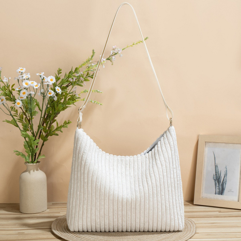 2025 nuevo bolso de lana transfronterizo de gran capacidad de mujer, mochila de hombro de otoño y invierno, alta calidad, ligera y versátil para viajar